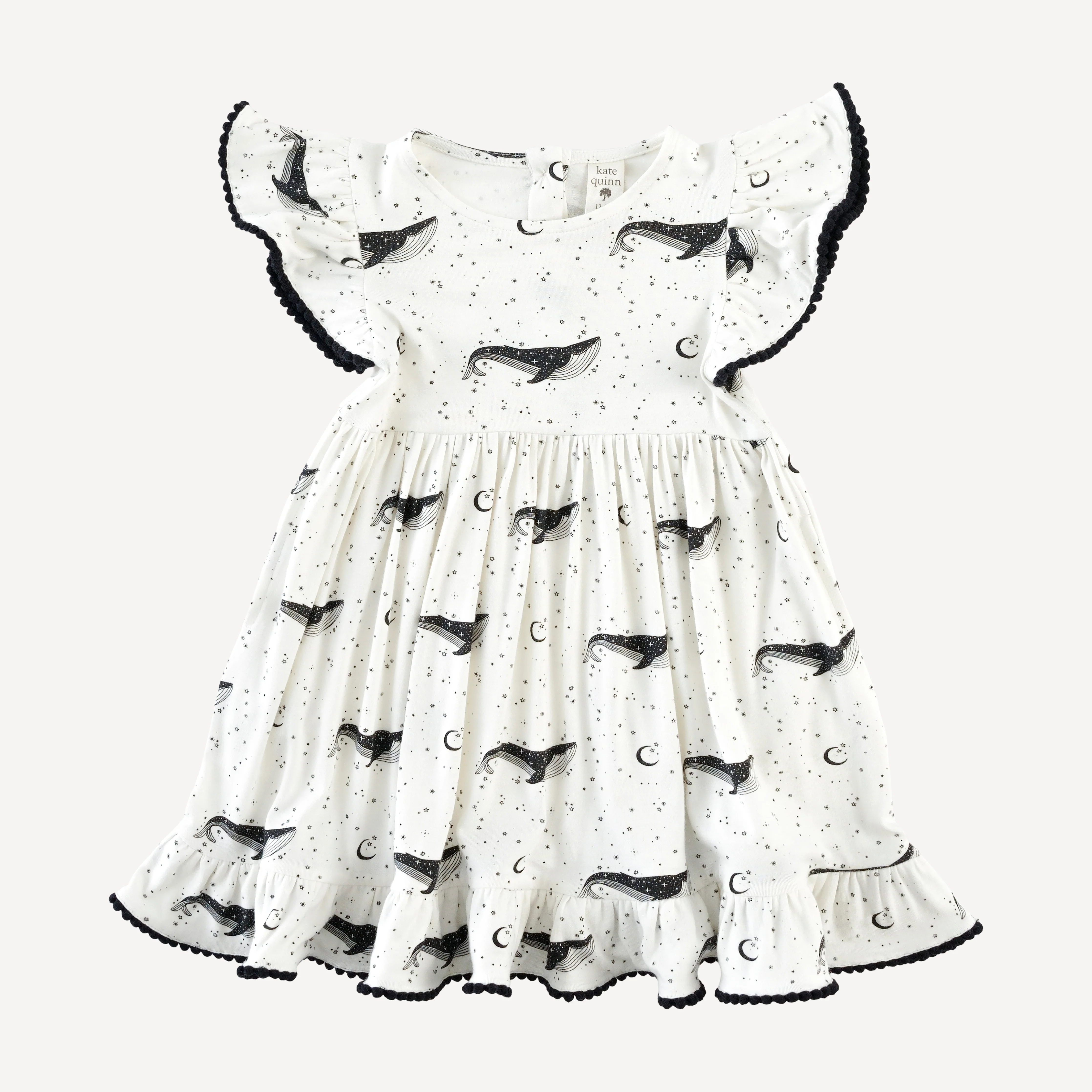 flutter sleeve pom pom pinafore dress | mystical whales | bamboo