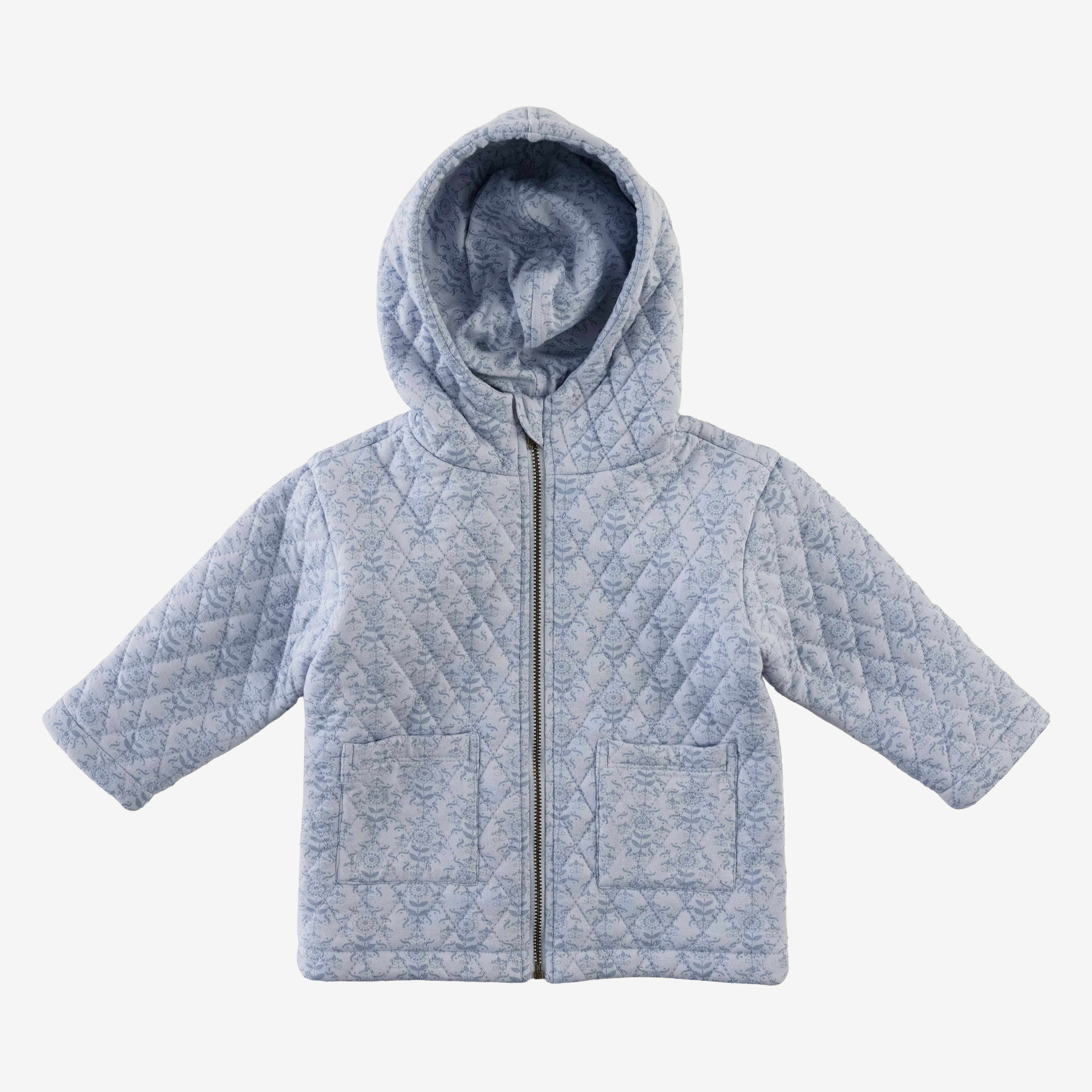 quilted hooded jacket | cornflower folk wallpaper | bamboo
