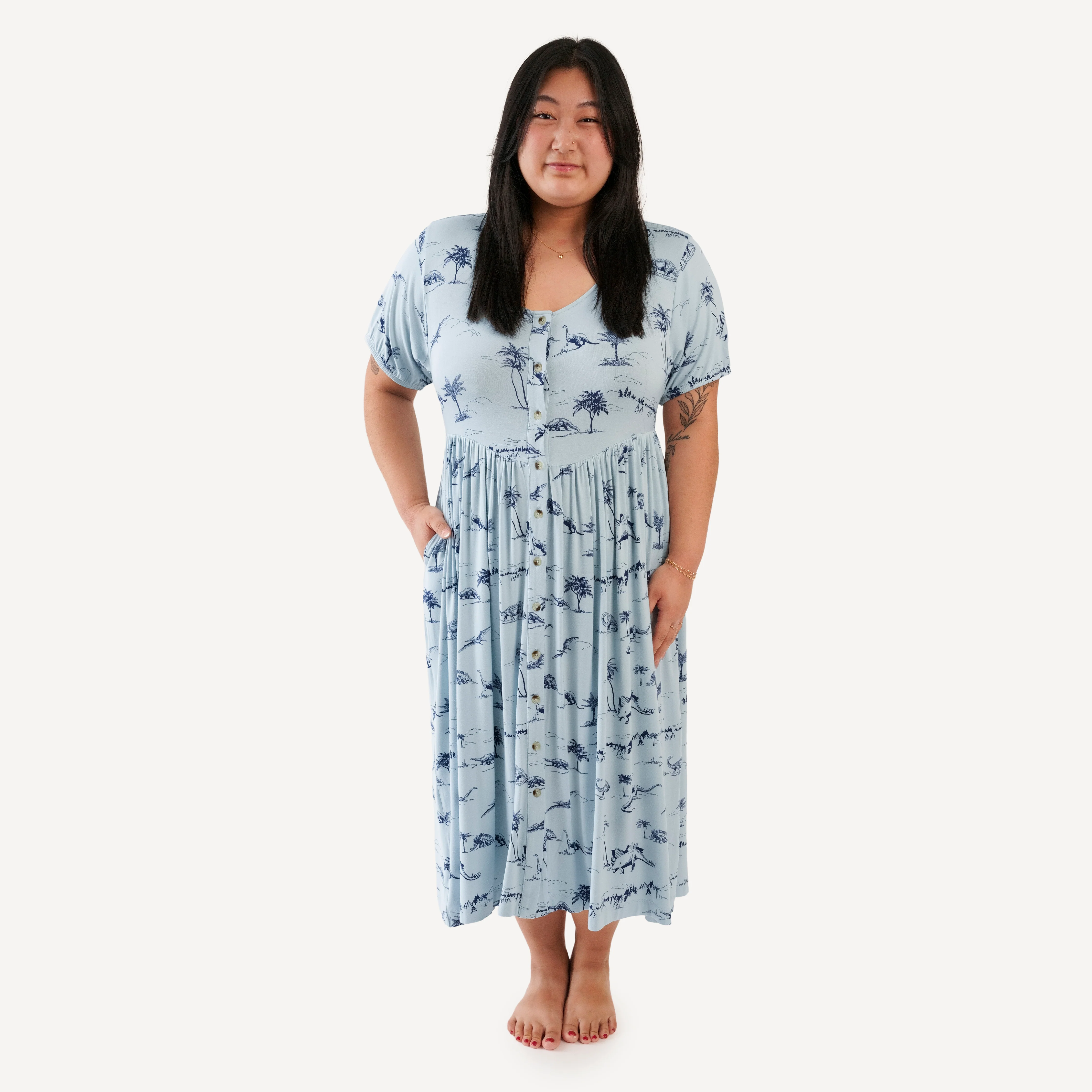 womens short sleeve button front v-waist dress | blue dino landscape | bamboo
